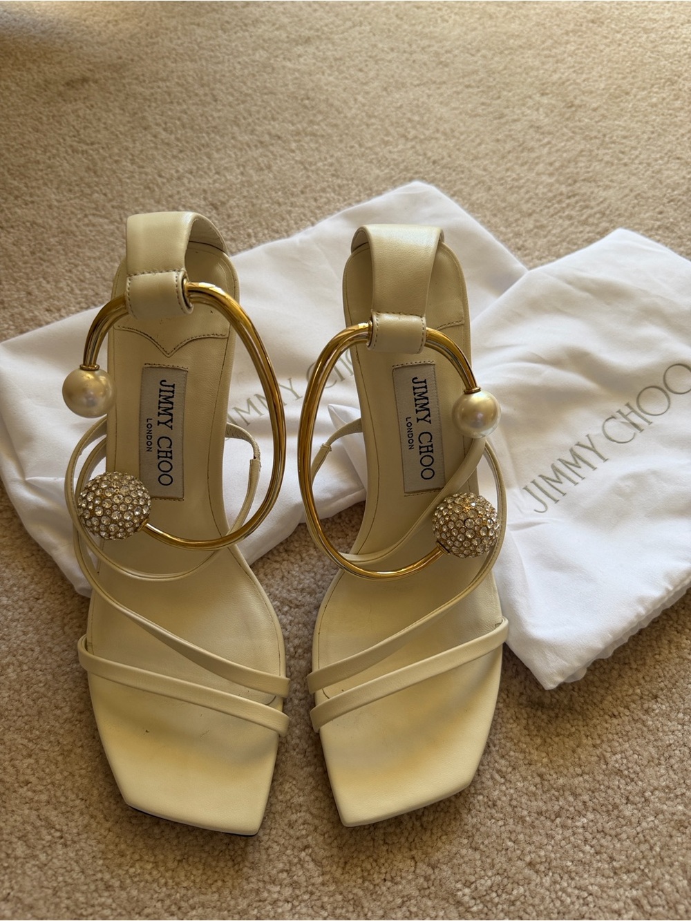 Jimmy Choo Cream Leather Hoop Detail Sandals with Gold Accents